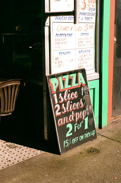 Chalkboard outside a pizza shop