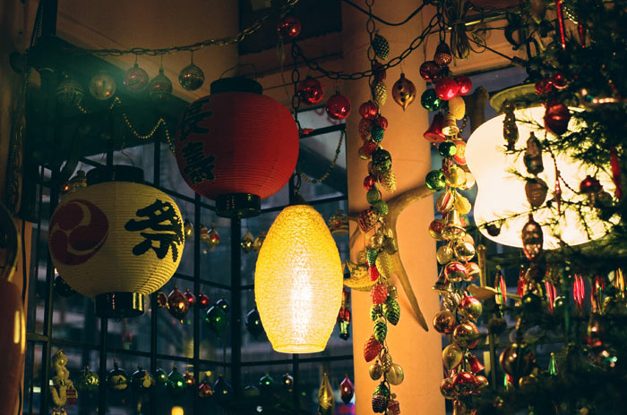 Lanterns and Christmas ornaments in a window